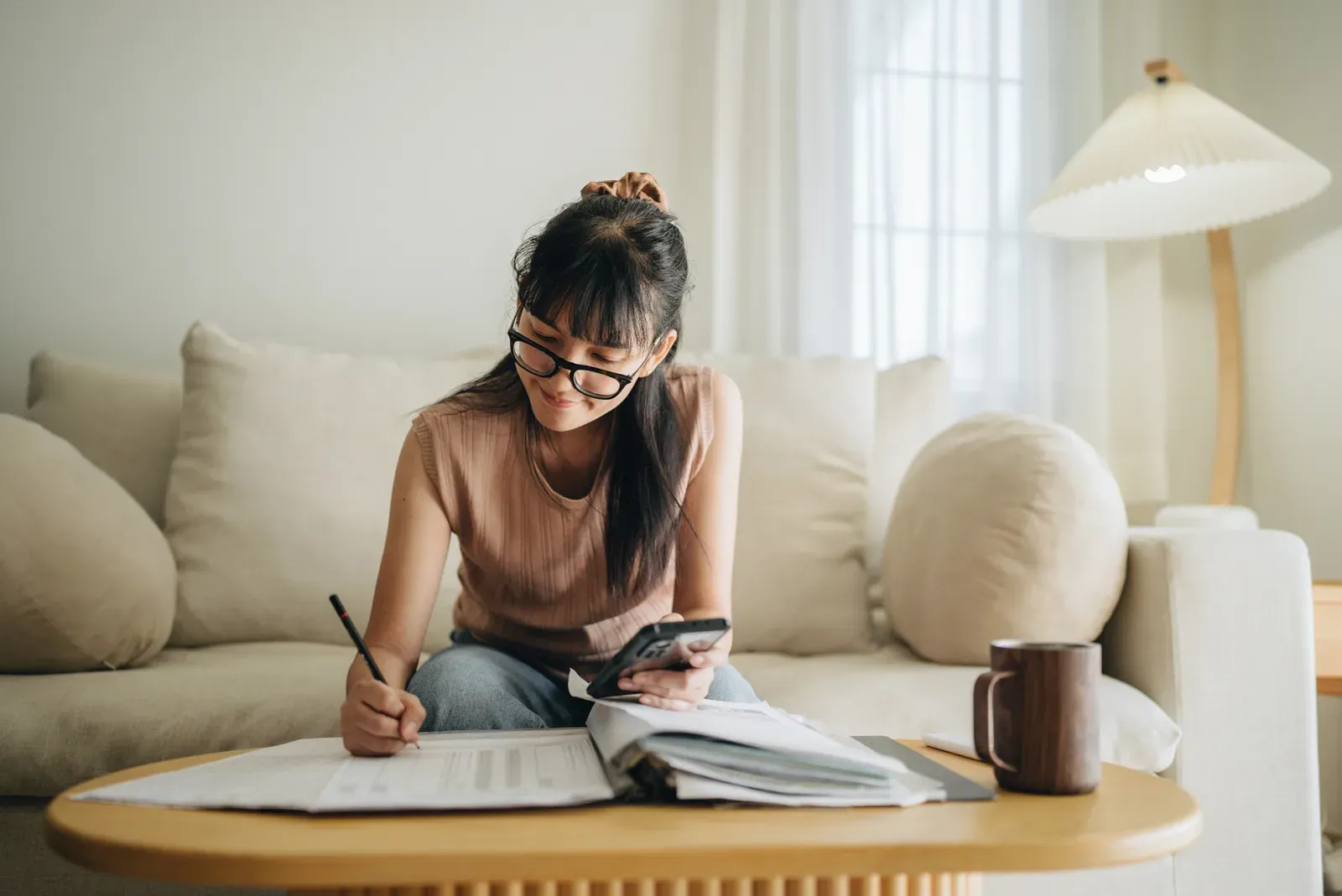 Comparing session prices with a smartphone calculator while planning a training budget