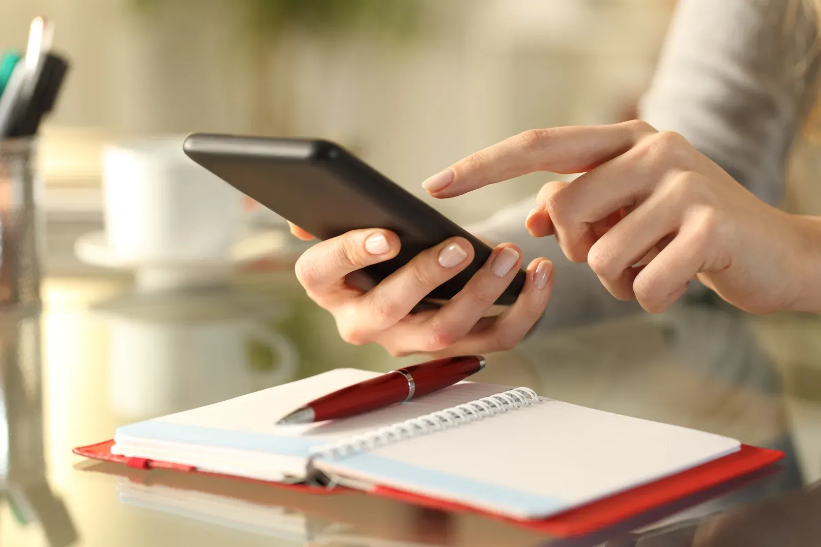 Person scheduling an appointment in a phone calendar app