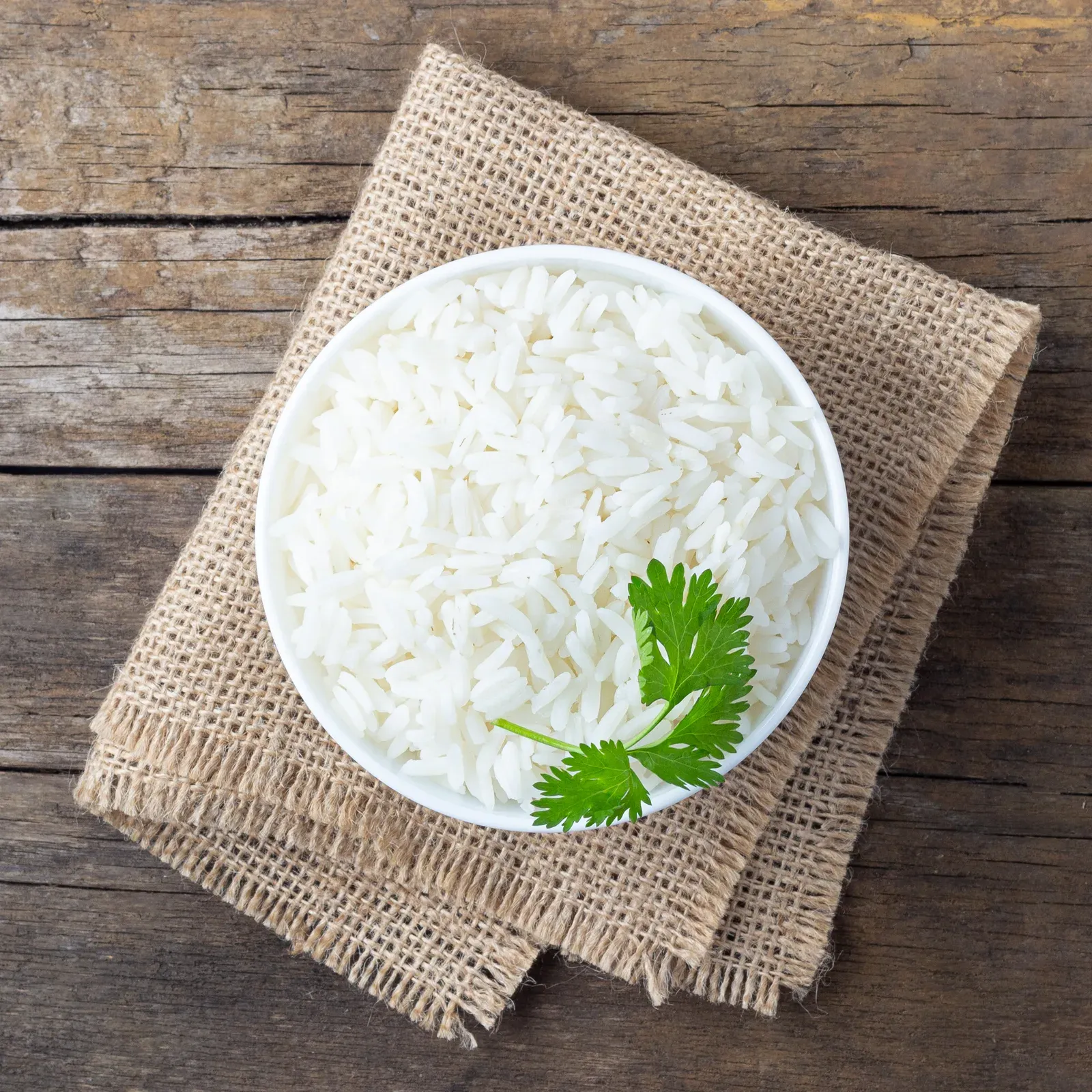 Boiled rice in a bowl, a common carbohydrate source in the carbs and lifting question