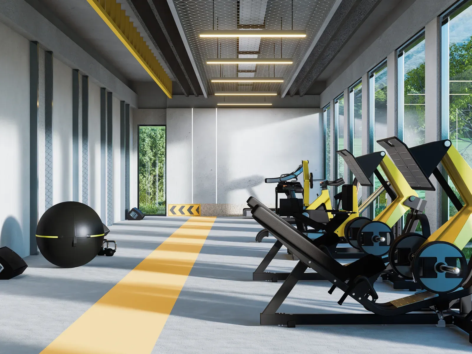 Gym room interior with fitness equipment and machines, a setting that helps compare gyms and health clubs