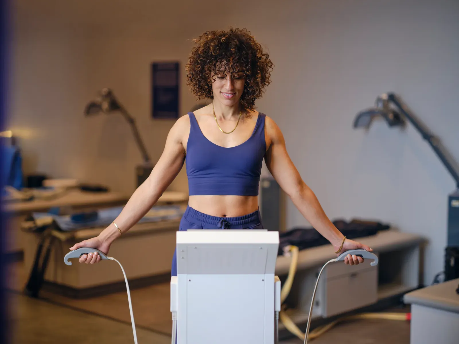 Stepping onto a body composition analysis machine for a full scan