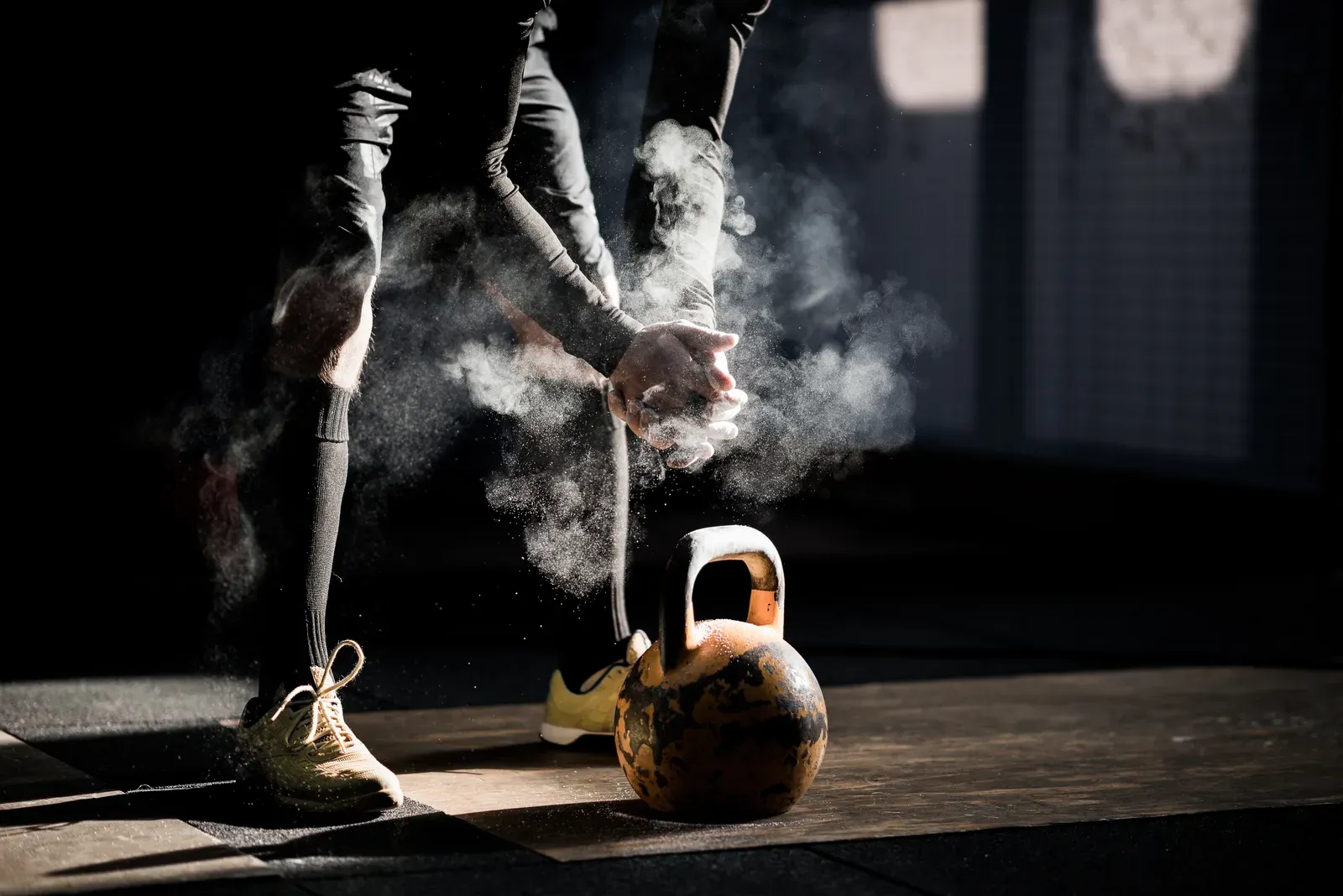 Man in the gym set to push past a plateau with kettlebell work
