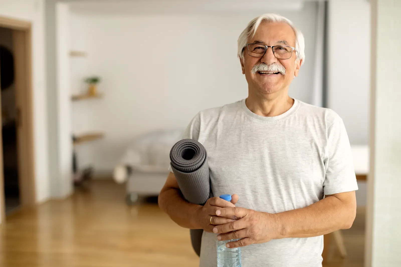 Man keeping up his exercise routine on his own between sessions